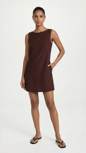 Chocolate Linen Blend Boat Neck Mini Shift Dress showcased on a model in a rich chocolate hue with side pockets.