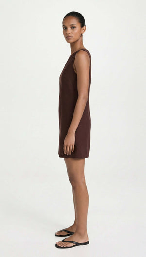 Chocolate Linen Blend Boat Neck Mini Shift Dress showcased on a model in side profile, highlighting its sleek design.