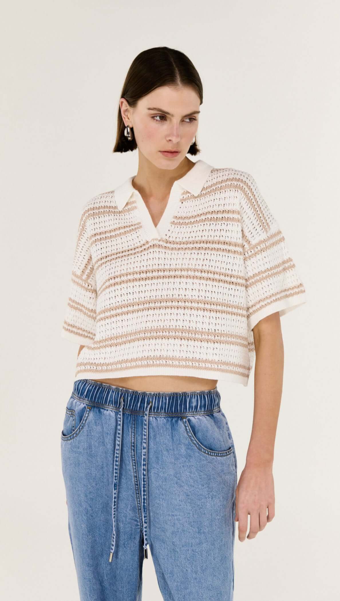 Cotton Blend Stripe Knit Polo displayed on a model, featuring a cropped length and soft open-knit texture.