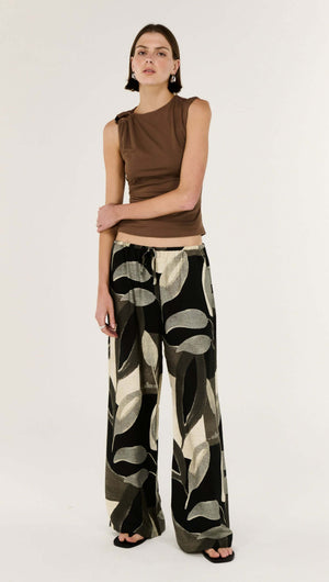 Model wearing Dark Leaf Relaxed Wide-Leg Pant with flowing silhouette and Leaf Garden print for effortless style.