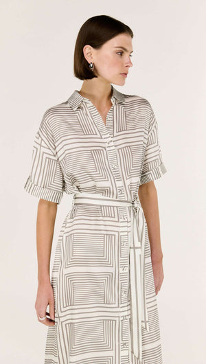 Model showcasing the Geometric Print Button Front Midi Shirt Dress with a classic collar and waist-cinching tie belt.
