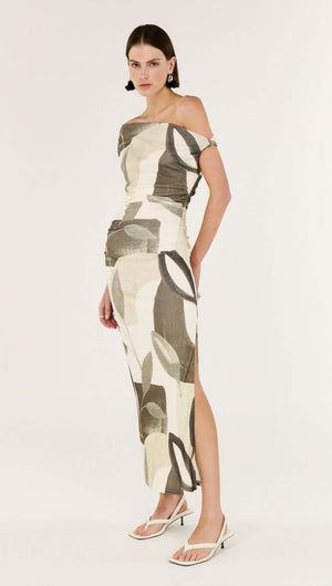 Green Leaf Off Shoulder Midi Dress on a model showcasing an elegant off-shoulder neckline with a sculptural twist detail.