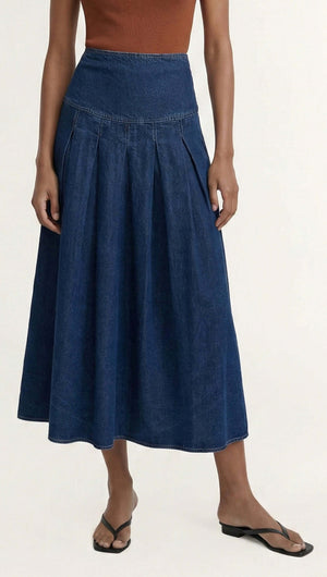Indigo Chambray Box Pleat Midi Skirt featuring a high waist and soft box pleats in a rich indigo wash.