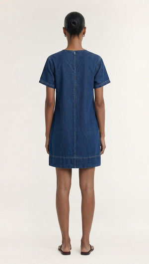 Back view of the Indigo Chambray Short Sleeve Mini Dress showcasing its clean lines and casual style.