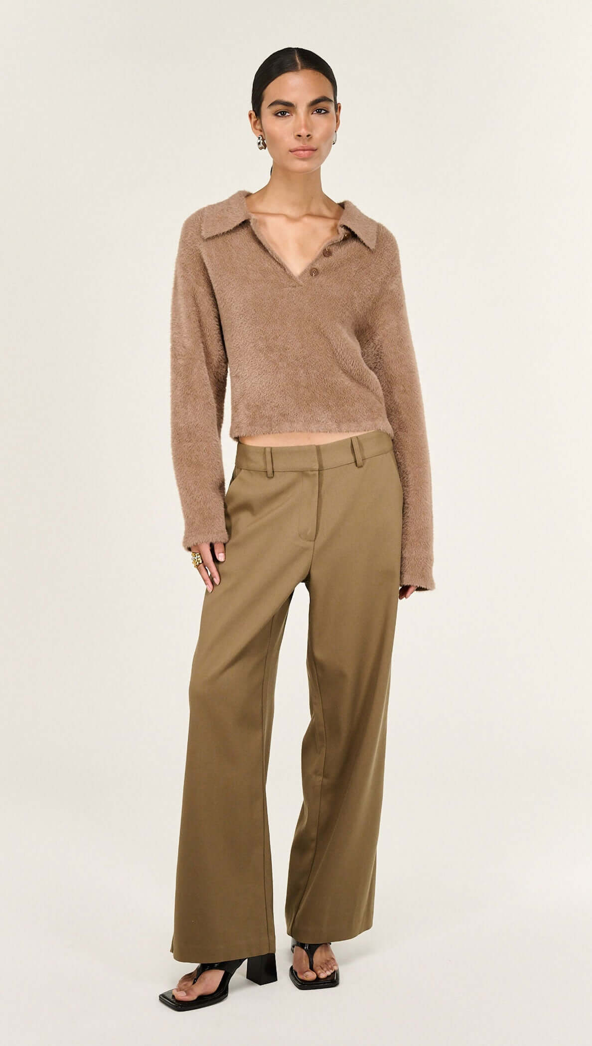 Model wearing a Mocha Fluffy Knit Polo Jumper with a relaxed silhouette and refined collar.