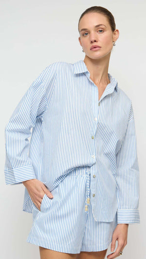 Cotton Blue & White Drawstring Shorts featuring a relaxed fit and side pockets, model wearing a matching top.