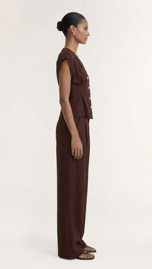 Rhodes Chocolate Linen Blend V-Neck Cropped Top displayed on a model in profile, showcasing its chic design and rich hue.