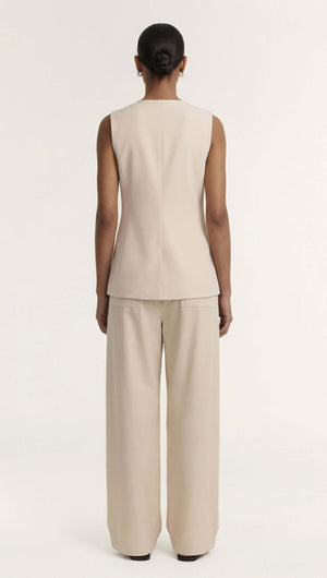 Stone Cotton Wide Leg Drawstring Pant shown from the back in a soft neutral hue, designed for relaxed summer wear.