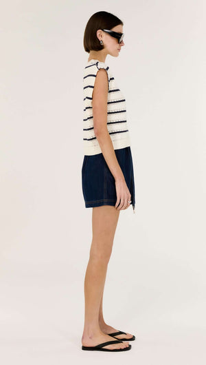 Striped Cotton Blend Knit Tank worn with stylish denim shorts, showcasing a sleeveless silhouette and classic stripe design.