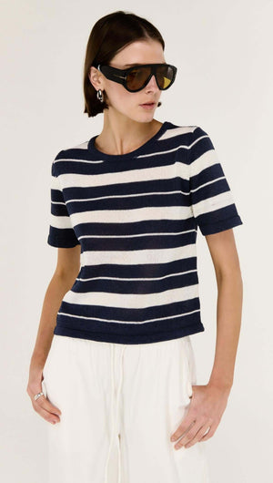 Striped Crew Neck Knit Tee worn by model with sunglasses, featuring classic stripe design and short sleeves.