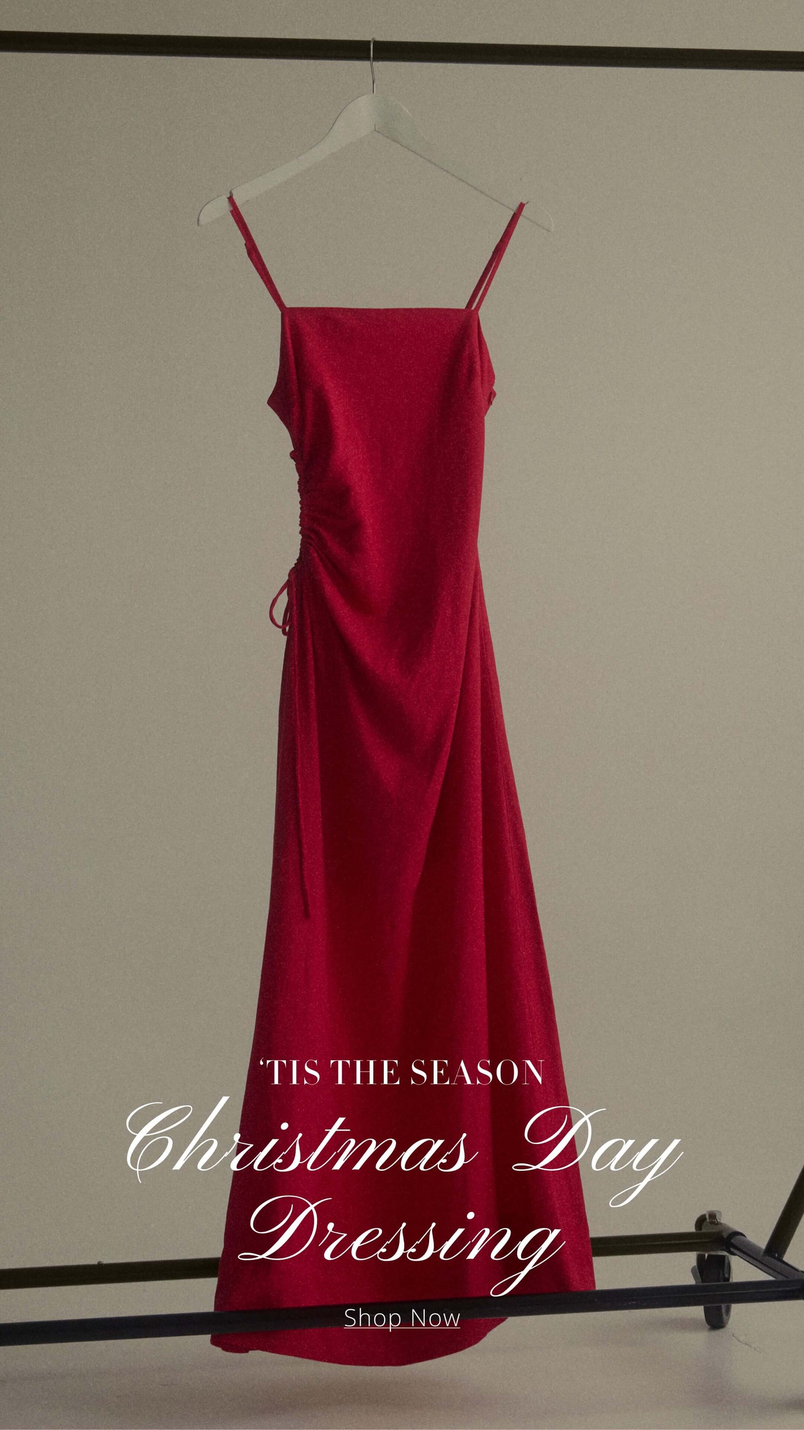 Elegant red dress for Christmas Day celebrations, featuring spaghetti straps and a flattering silhouette.