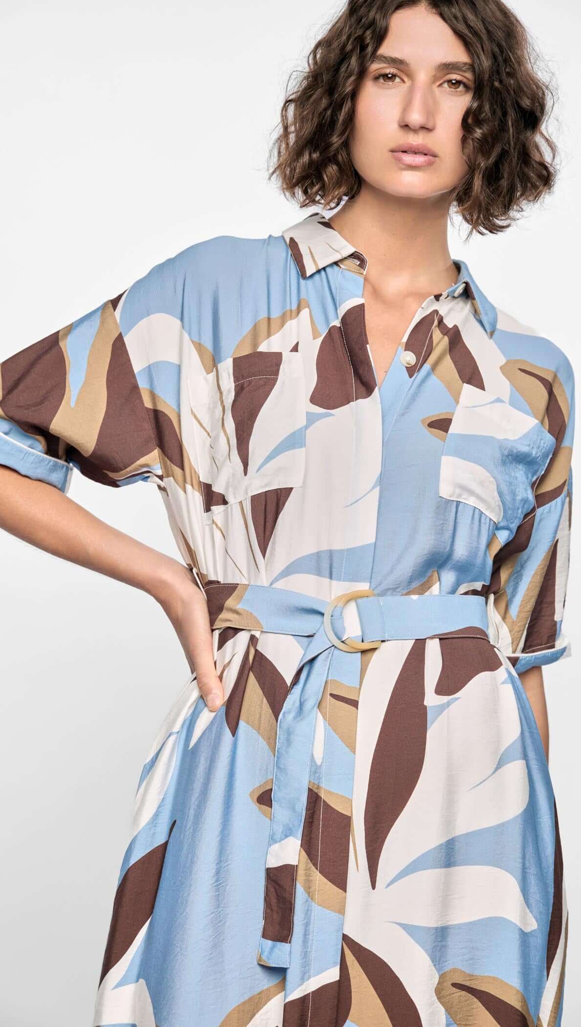 Maeve Midi Shirt Dress featuring abstract brown, cream, and blue print with button-down front and D-ring waist tie.