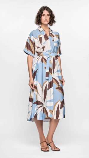 Maeve Midi Shirt Dress featuring a relaxed button-down silhouette with abstract blue, cream, and brown print, adjustable waist tie.