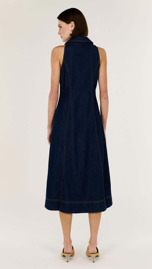 Back view of Denim Sleeveless Midi Shirt Dress featuring structured indigo denim and A-line silhouette.