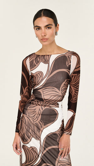 Model wearing Abstract Leaf Print Mesh Midi Dress with bold organic patterns and long sleeves.