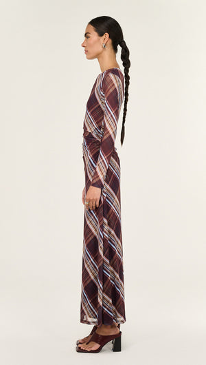 Model wearing a Plaid Mesh Long Sleeve Midi Dress in side view, showcasing its elegant silhouette and contemporary design.