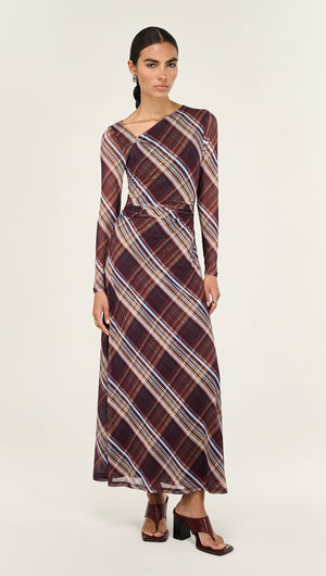 Model wearing a Plaid Mesh Long Sleeve Midi Dress with a contemporary design and elegant fit.