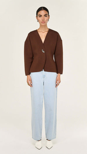 Chocolate Sculptured Soft Cardigan with Hardware Detail worn with light blue jeans, showcasing a stylish and modern outfit.