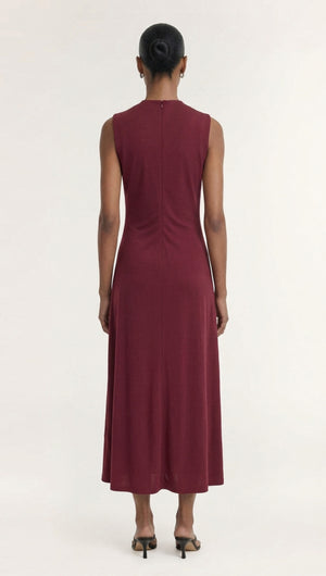 Burgundy Twist Detail Jersey Midi Dress showing the back view on a model with a sleek hairstyle