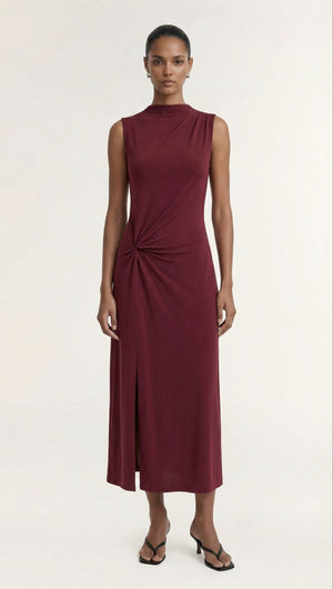 Burgundy Twist Detail Jersey Midi Dress featuring a stylish twist design and elegant slit for a chic look.