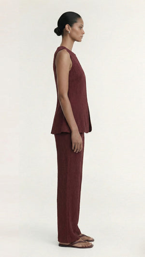 Burgundy Round Neck Textured Vest worn with matching pants, showcasing a modern silhouette and refined tailoring.