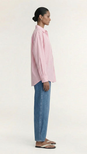 Oversized Cotton Shirt with Back Button Detail shown in side view, featuring striped pattern and relaxed fit.