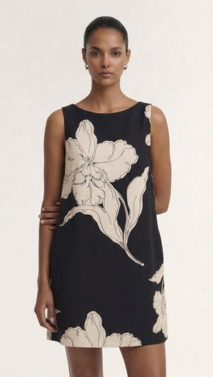 Sketched Floral Sleeveless Mini Dress featuring elegant floral patterns on a black background.