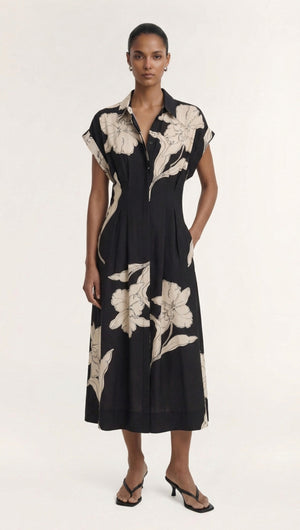 Cream Floral Midi Shirt Dress featuring a model wearing a black dress with floral print, perfect for casual or formal occasions.