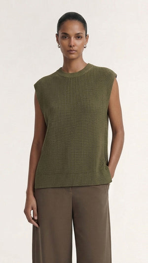 Khaki Cotton Blend Knit Tank Top model wearing a textured ribbed sleeveless top with a relaxed fit.