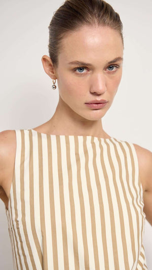 Cotton Stripe Mini Shirt Dress featuring a relaxed fit and scoop neckline, modeled by a woman with light skin and blue eyes.