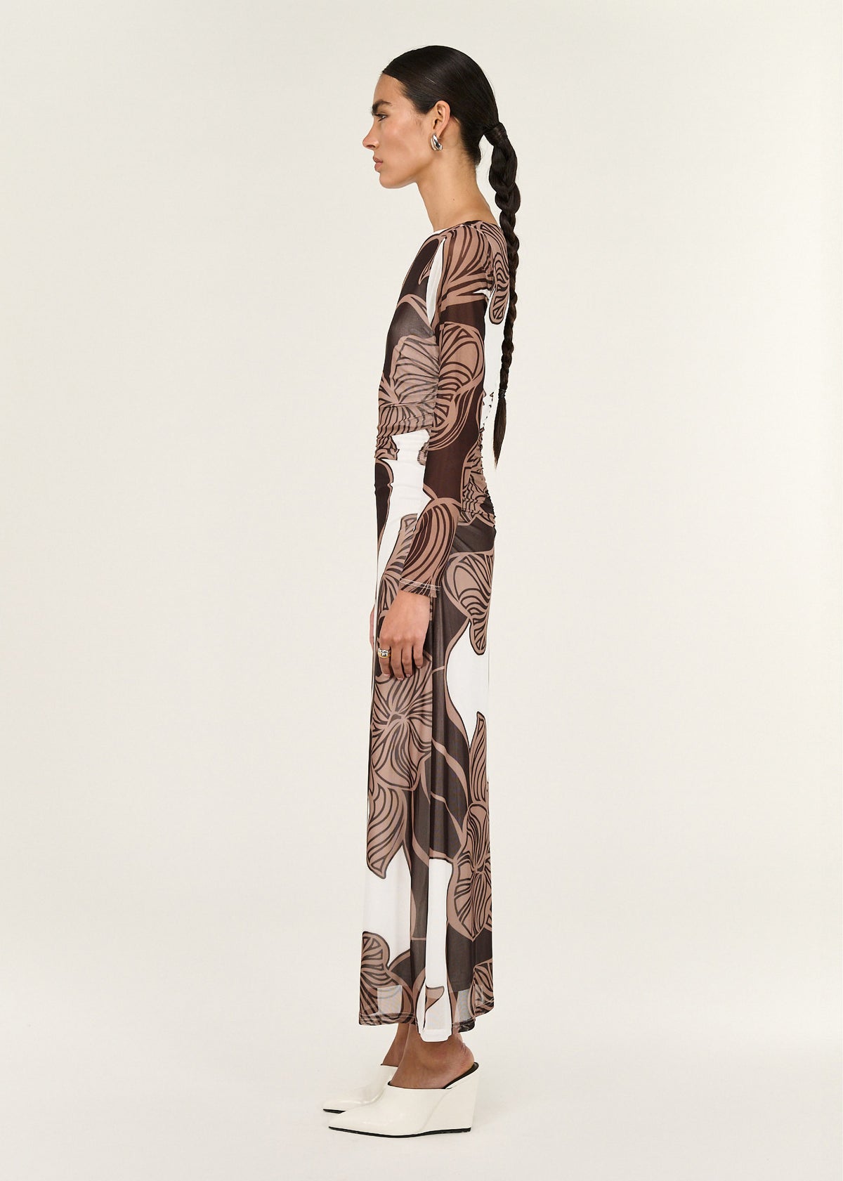 Side view of the Abstract Leaf Print Mesh Midi Dress, showing an abstract leaf print design and a soft, fluid drape.