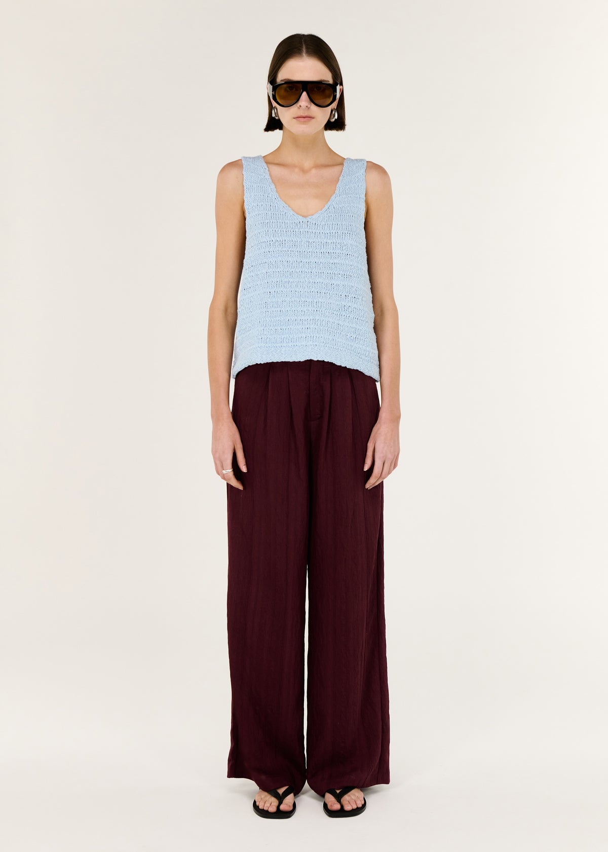 Model wearing Baby Blue Cotton Knit Tank with a soft textured knit fabrication and a relaxed, easy fit.