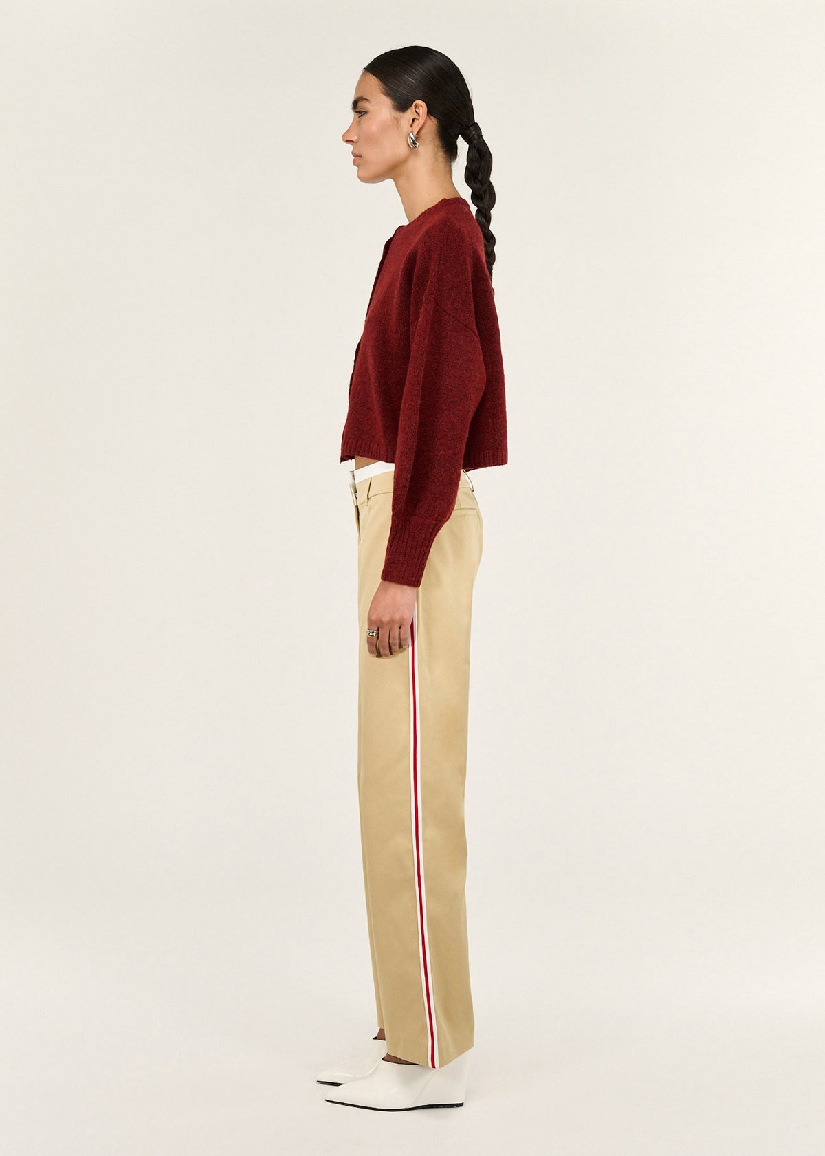 Side view of the Beige Striped Contrast Waist Pants, showing a mid-rise waist and a straight leg silhouette.