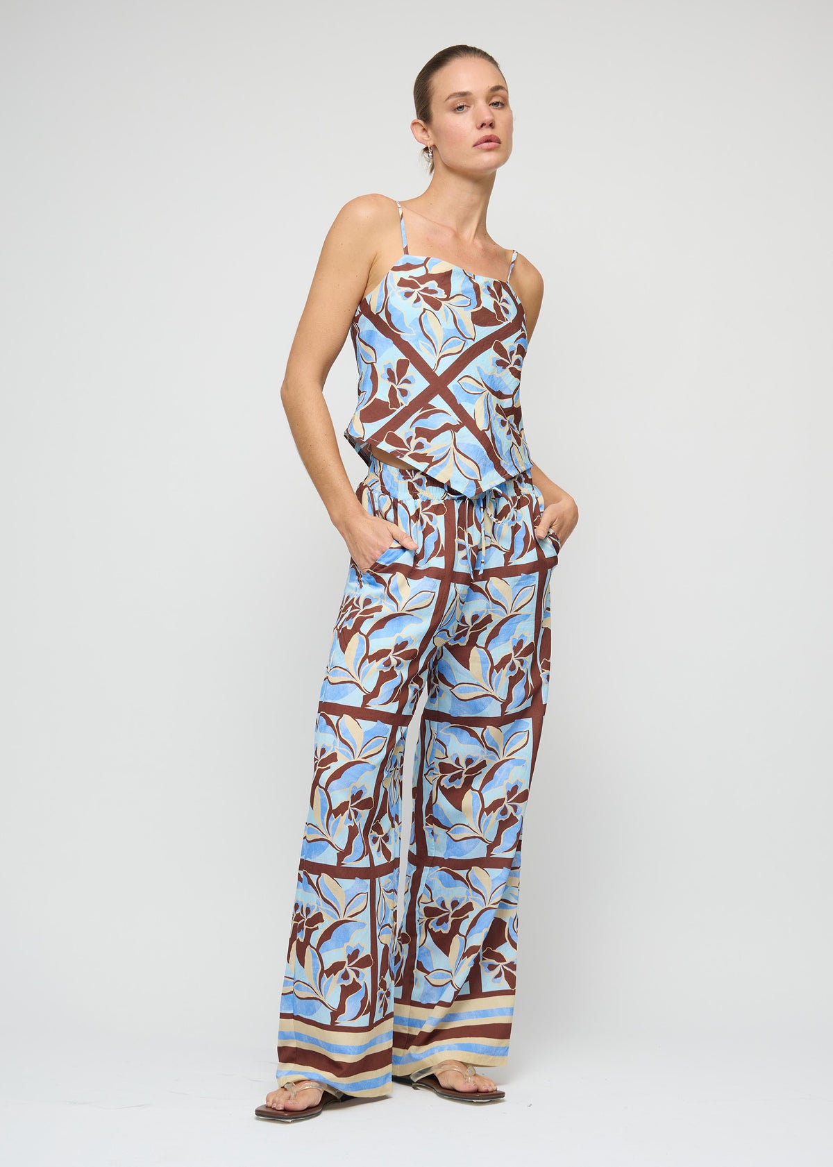 Model wearing Blue Abstract floral Scarf Cami Top with a relaxed fit through the body and an abstract print exclusive to Staple the Label.