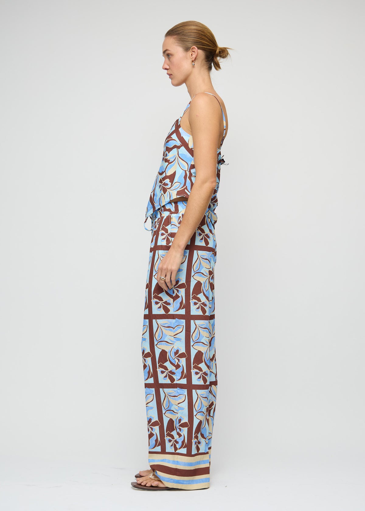Side view of the Blue Abstract floral Scarf Cami Top, showing a lightweight and fluid fabrication.