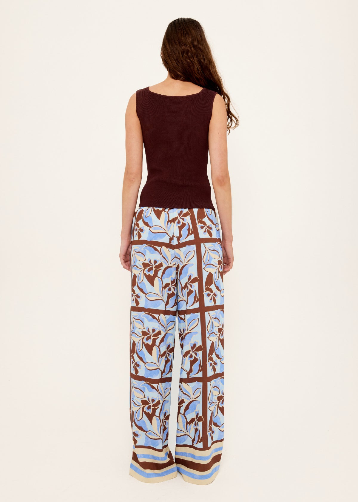 Back view of the Blue Abstract floral Wide-Leg Drawstring Pants with an elasticated waistband with drawstring tie.