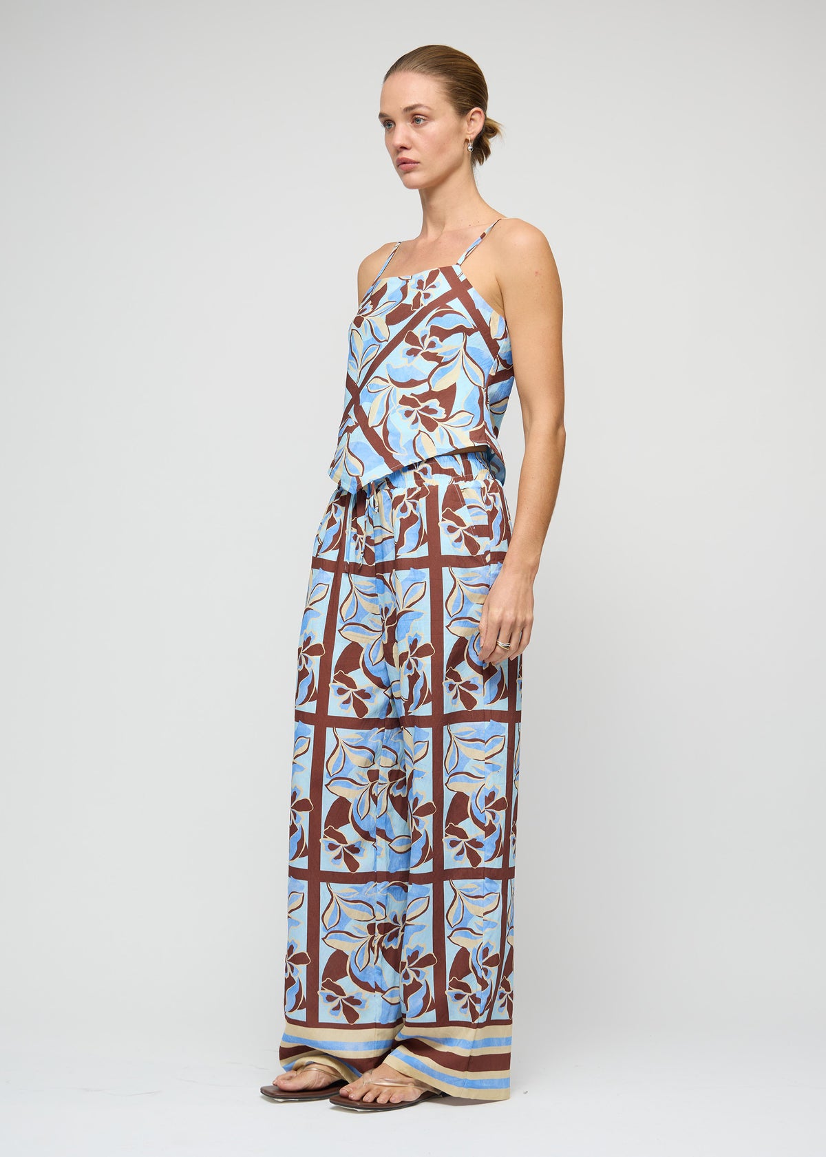 Model wearing Blue Abstract floral Wide-Leg Drawstring Pants, showing an abstract geometric print exclusive to Staple the Label.