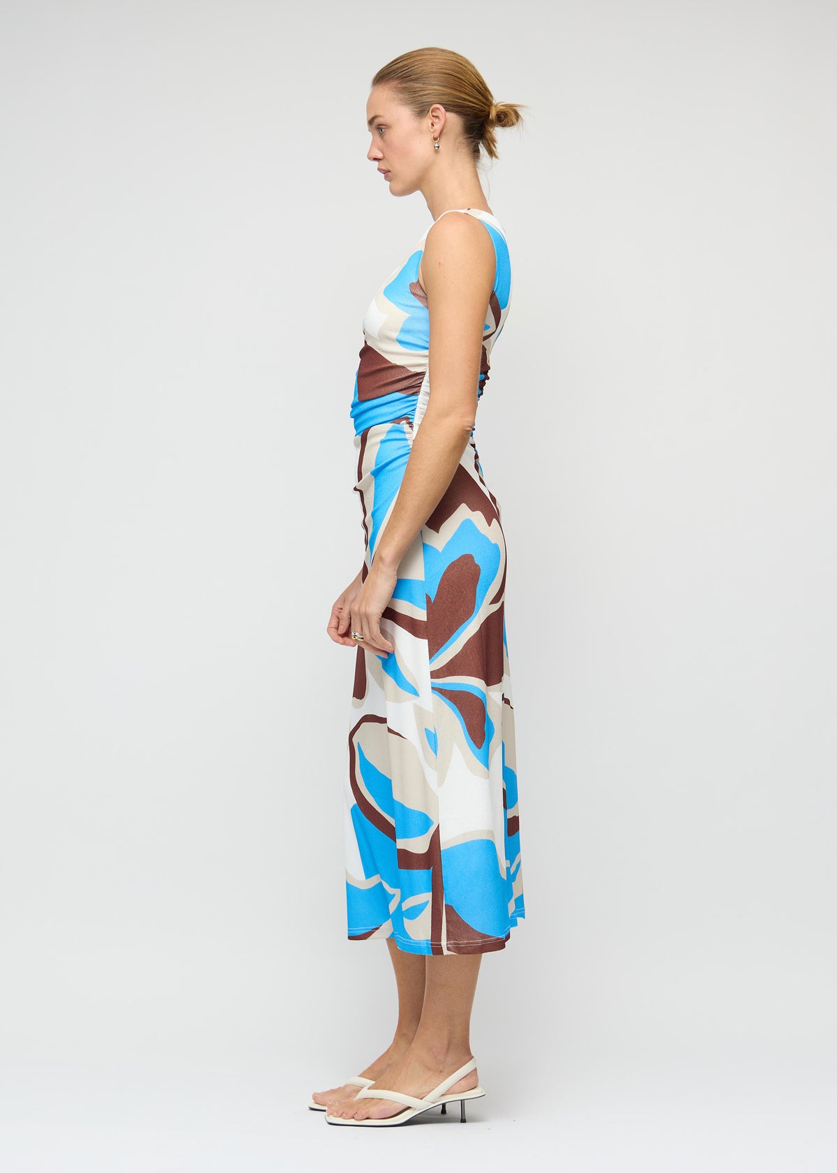 Side view of the Blue Abstract Mesh Midi Dress, showing an abstract print exclusive to Staple the Label and a fully lined.