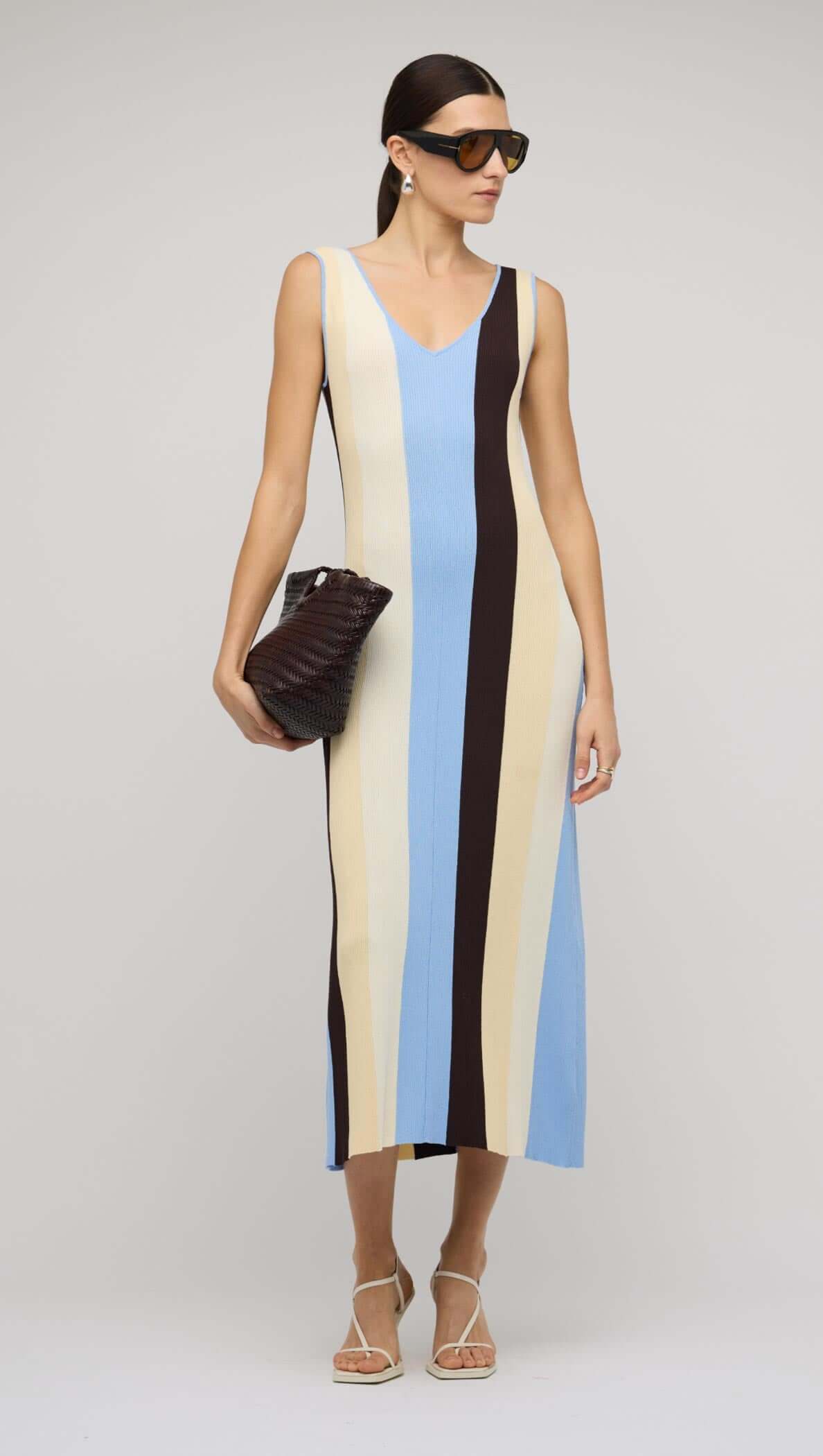 Blue & Cream Stripe Knit Midi Dress with bold vertical stripes, perfect for modern sophistication and all-day comfort.