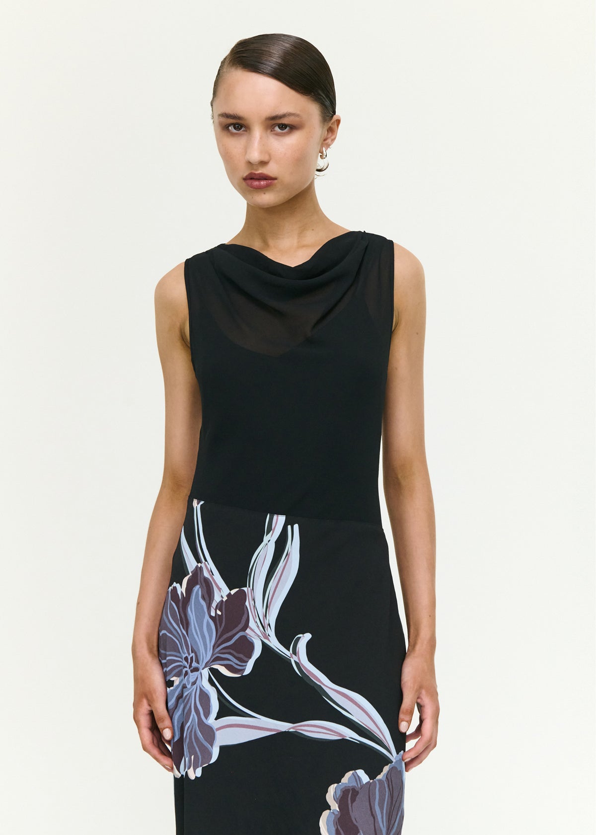 Close-up of the Blue Floral Bias Cut Combo Midi Dress, showing a sleeveless cut and a soft draped neckline.