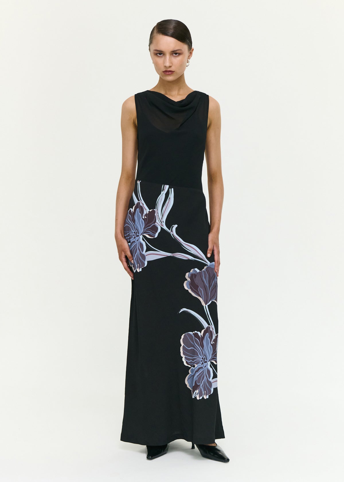 Model wearing Blue Floral Bias Cut Combo Midi Dress, showing a midnight floral print and a lightweight woven fabrication.