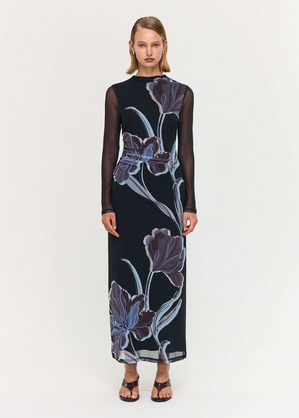 Model wearing Blue Floral Mesh Midi Dress, showing a midi length and a midnight floral print.