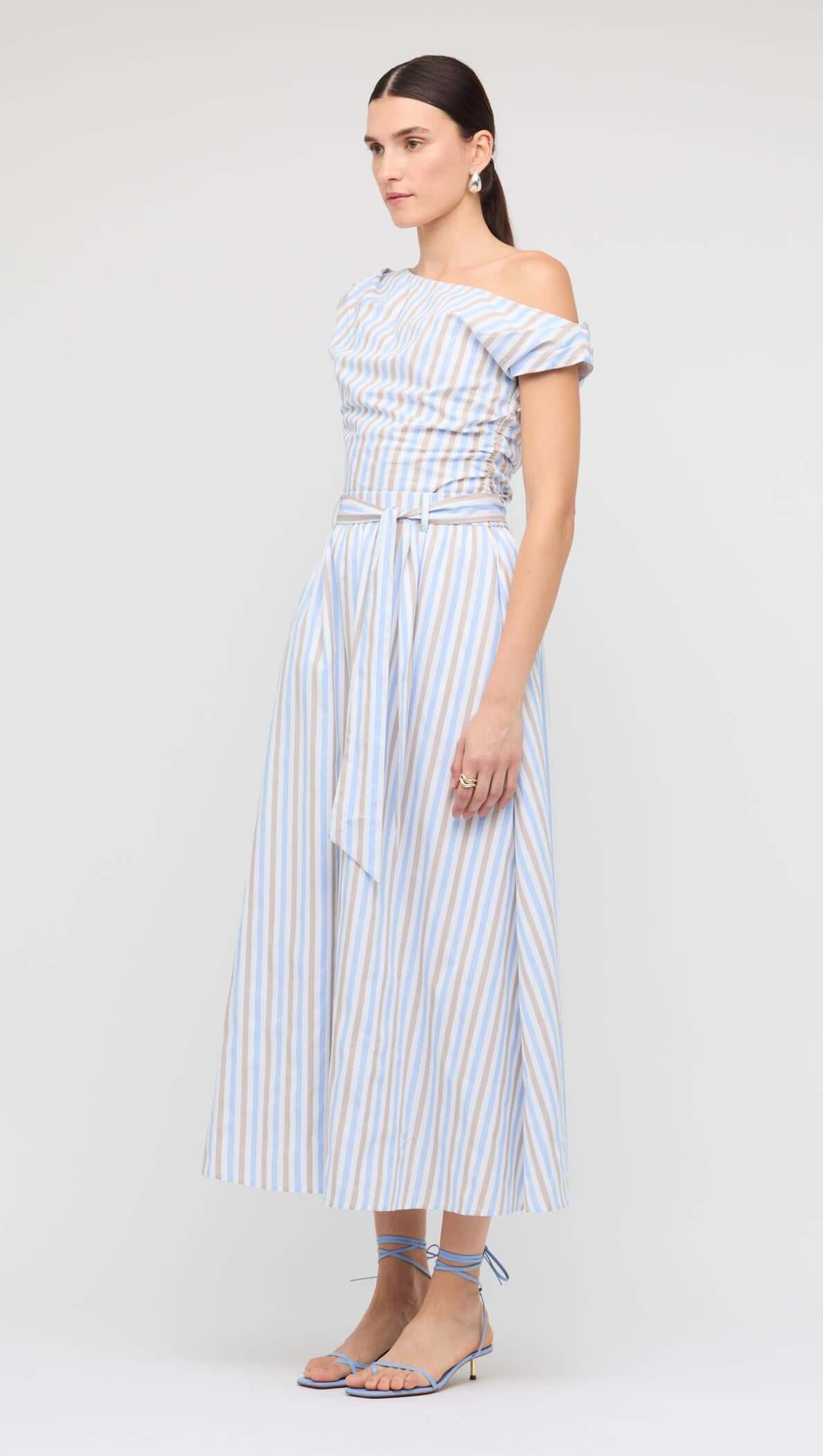 Model wearing the Blue Stripe Cotton A-Line Maxi Skirt by Staple the Label, showcasing its elegant design and fit.