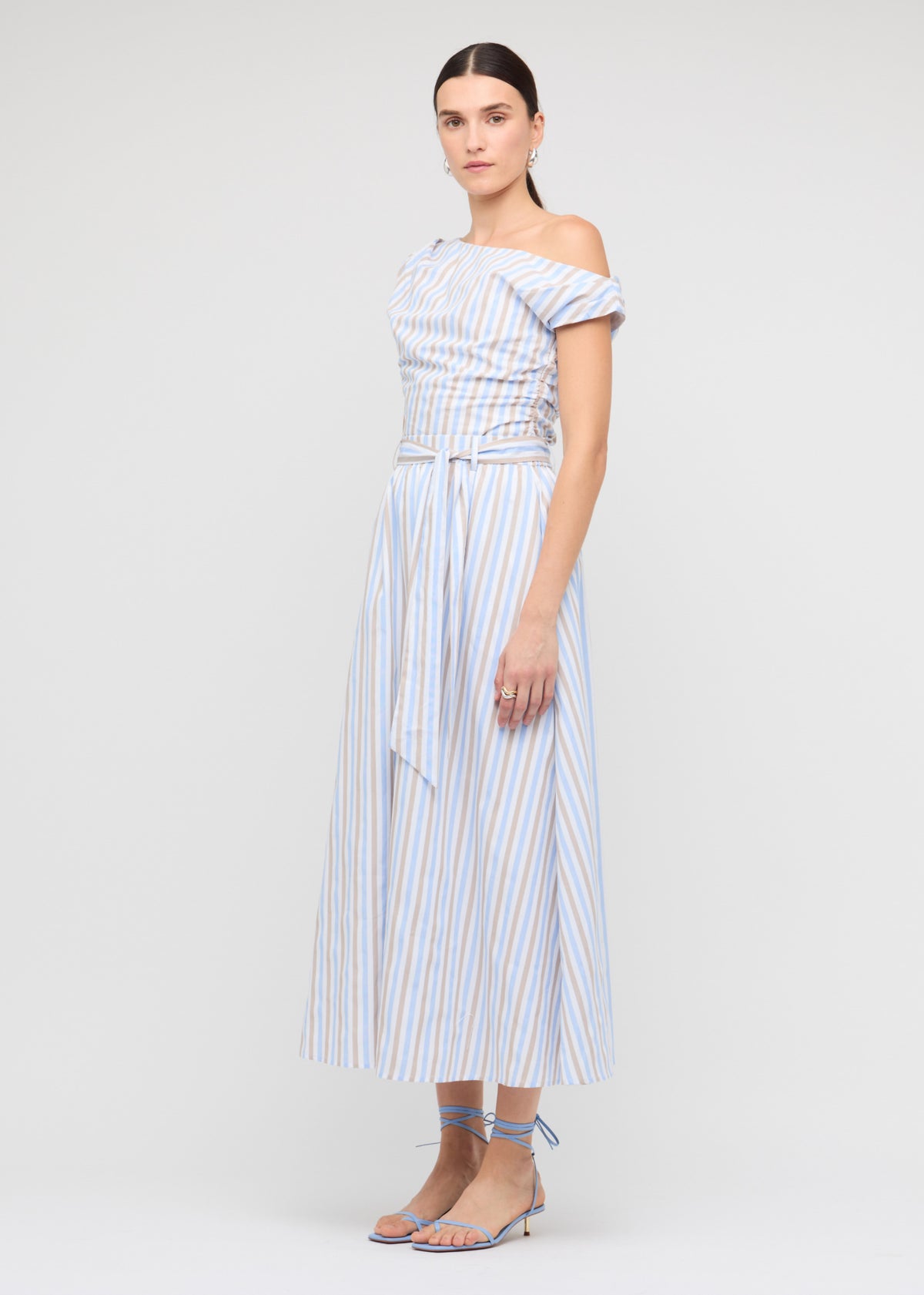 Model wearing Blue Stripe Cotton A-Line Maxi Skirt with a relaxed A-line silhouette.