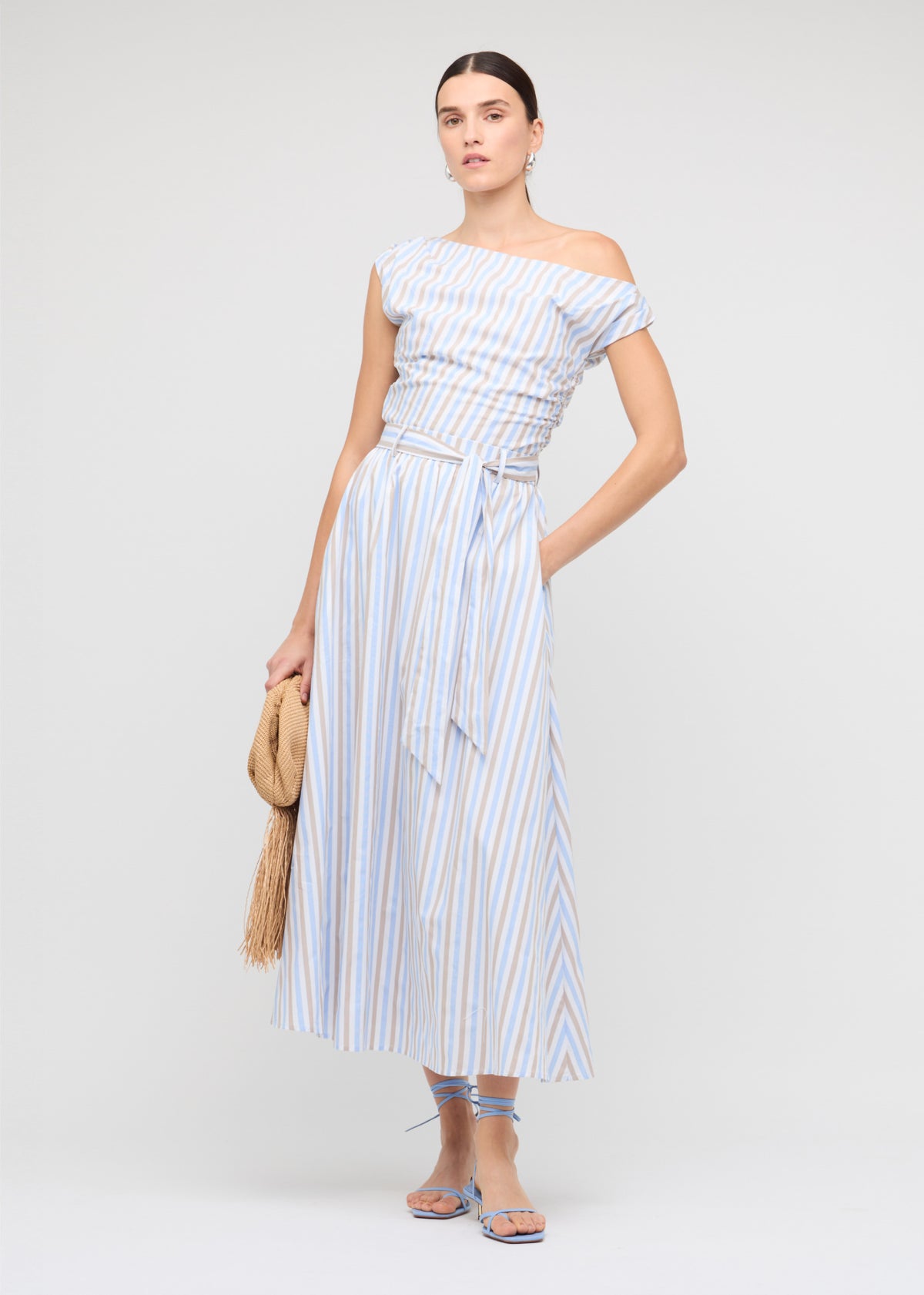 Model wearing Blue Stripe Cotton A-Line Maxi Skirt with a blue and neutral stripe design.