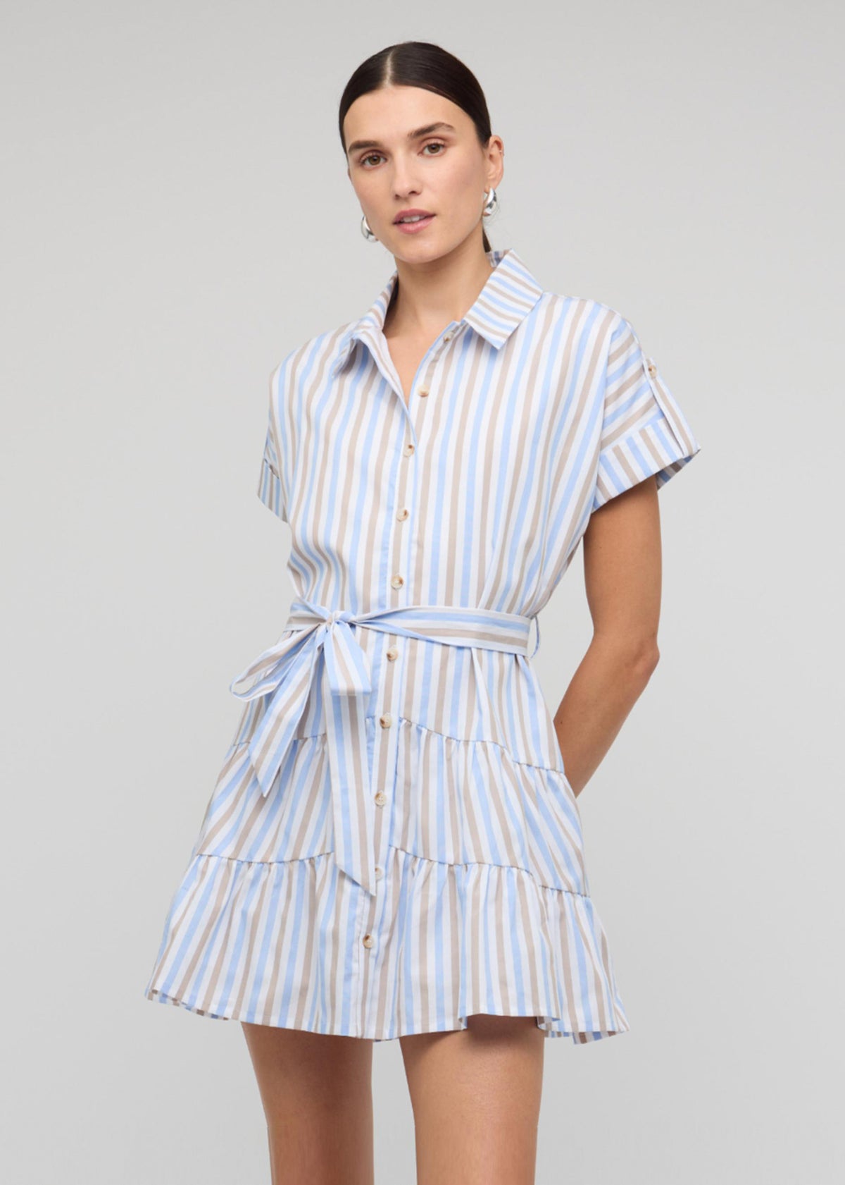 Model wearing Blue Stripe Cotton Mini Shirt Dress, showing a relaxed shirtdress silhouette and a button-down front.