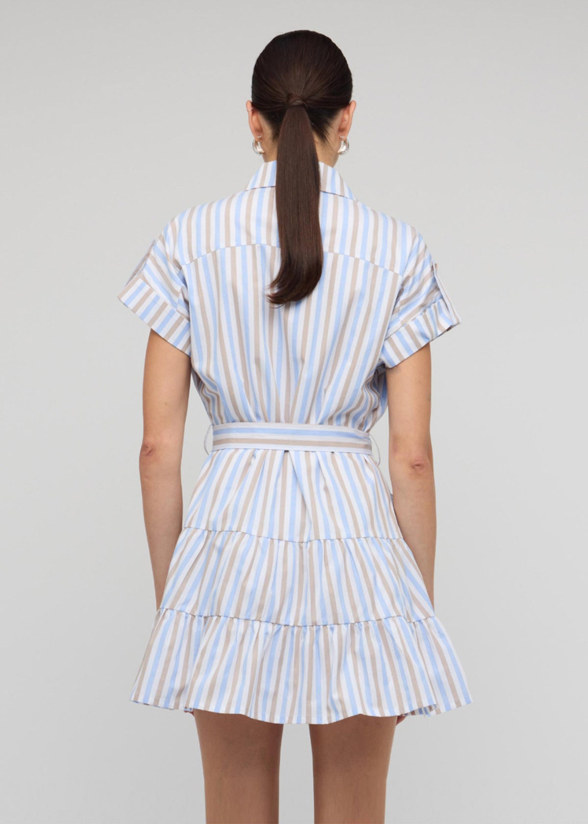 Back view of the Blue Stripe Cotton Mini Shirt Dress, showing a button-down front and an adjustable waist tie.
