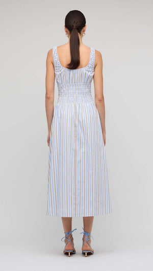 Back view of the Blue Stripe Cotton Shirred Midi Dress showcasing the shirred bodice and relaxed A-line skirt.