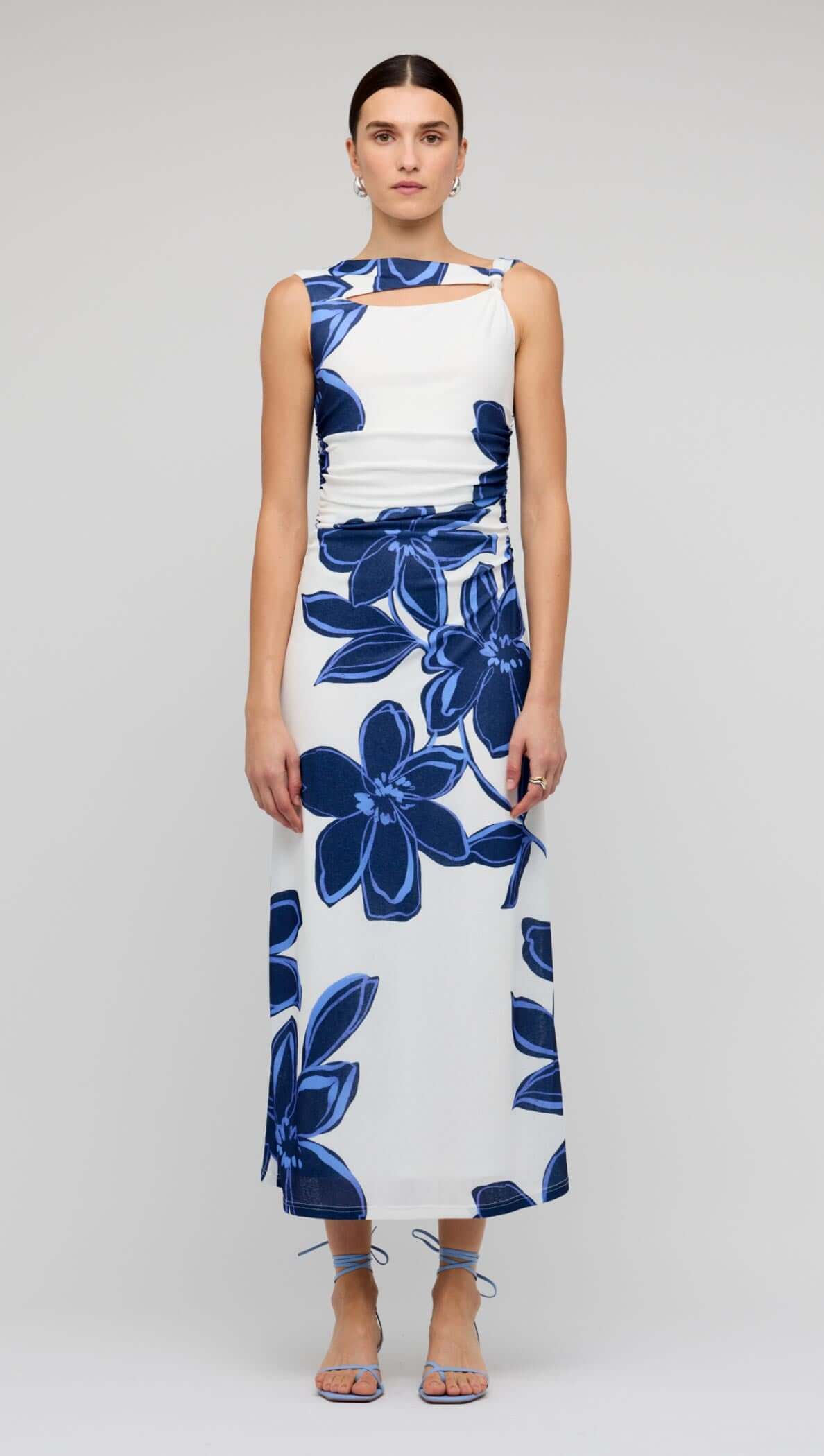 Blue & White Floral Mesh Midi Dress by Staple the Label on a model, featuring oversized floral print and sleeveless design.