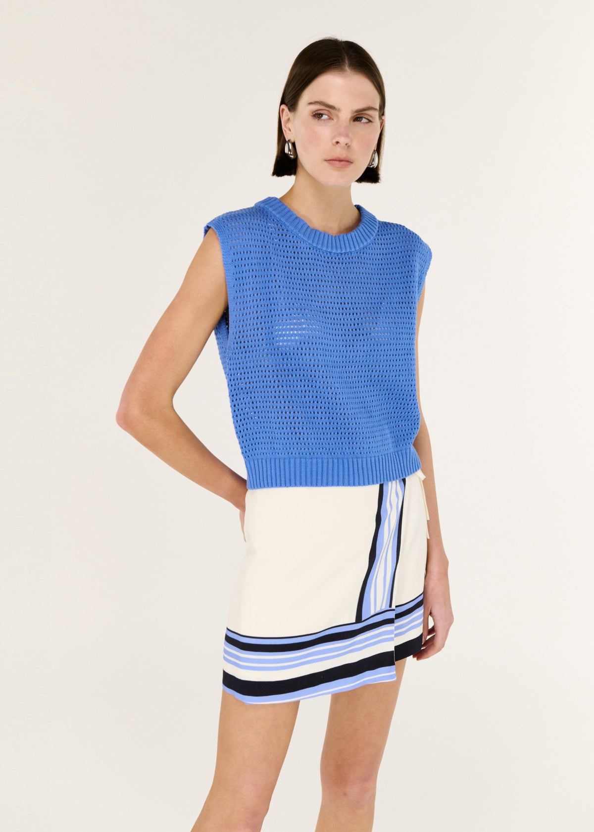 Close-up of the Blue Wide Gauge Cotton Blend Knit Tank, showing a crew neckline.